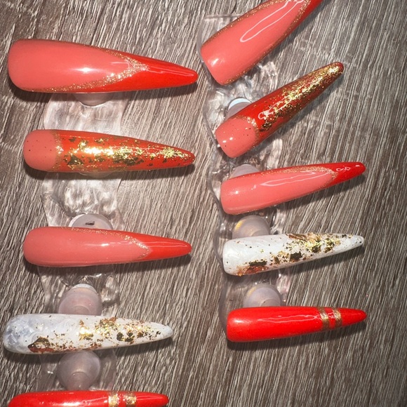 Red and gold stiletto nails! 2 white marbled nails with gold flakes! Gorgeous! - Picture 9 of 12